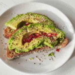 Whole grain avocado toast with hemp seeds and pomegranate 3 Whole grain avocado toast with hemp seeds and pomegranate